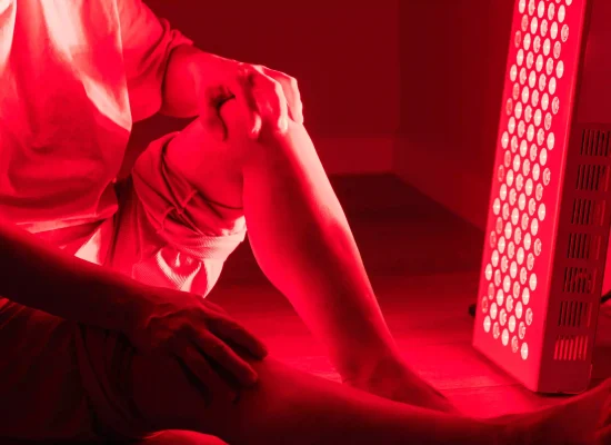 close-up-of-elderly-woman-using-red-light-therapy-2026-01-09-11-00-26-utc