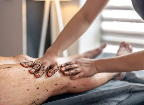 therapist-applying-body-scrub-nottingham.webp